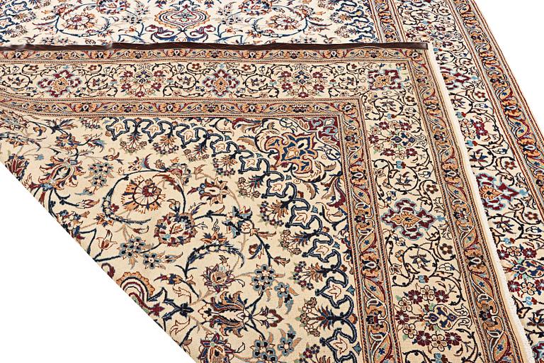 A Nain carpet, 9 laa, part silk, Iran, c. 335 x 245 cm.