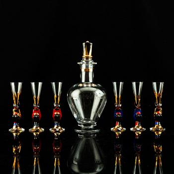 Gunnar Cyrén, a set of six "Devil" shot glasses and a decanter from the "Nobel" series, Orrefors Sweden post 1996.