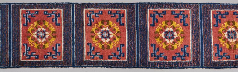 MATTO, a meditation carpet, ten squares, a semi-antique Ningxia, China, ca 598,5 x 62 cm.