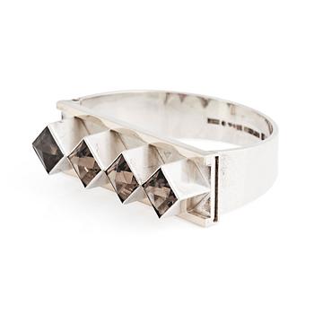 Sigurd Persson, a sterling silver, part gilt bangle with smoky qvartz (citrine), Stockholm 1963, executed by silversmith Peter Schmitt.