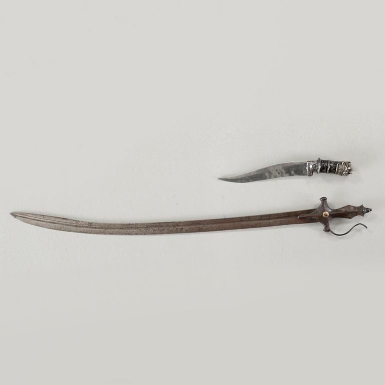 A tulwar and a knife from India, 19th century.