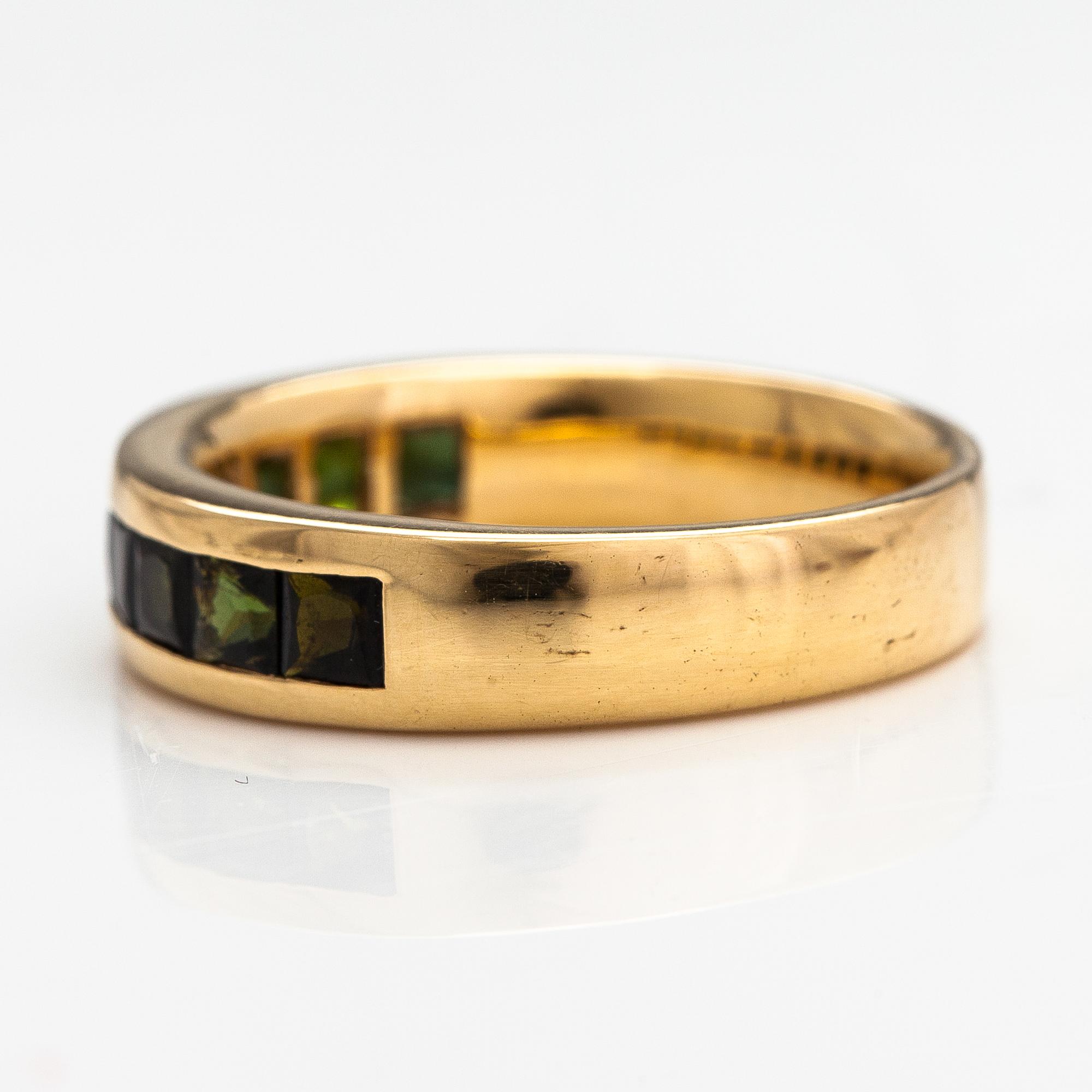 An 18K gold ring with tourmalines. Finland 2002.
