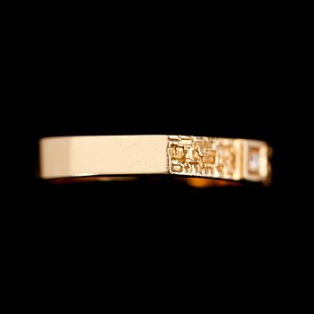 RING, 18 k guld, svenska stämplar 1984, briljant 0.02 ct enligt gravyr.