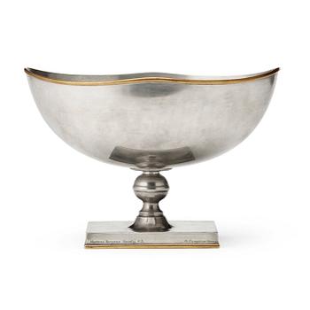 302. Nils Fougstedt, an oval pewter and brass footed bowl, Herman Bergman, Stockholm 1930.