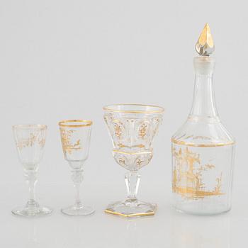 Two sets of wine glasses and a decanter with stopper, later part of the 18th century and later part of the 19th century.