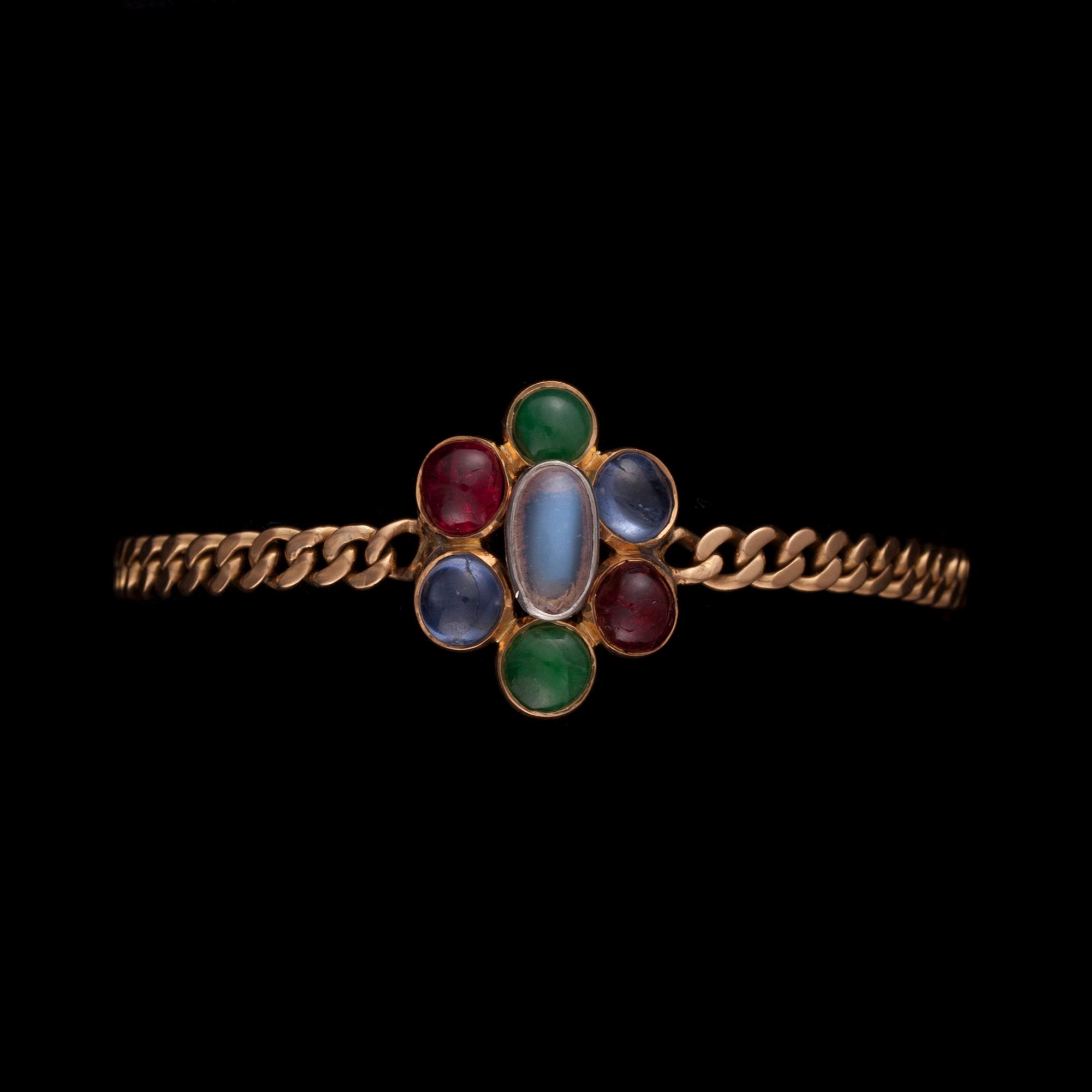 ARMBAND, 18K guld, månsten, rubiner, safirer, jade. Vikt ca 13,8 g.
