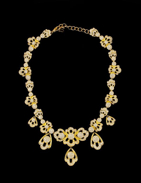 A necklace and a pair of earclips by Christian Dior.