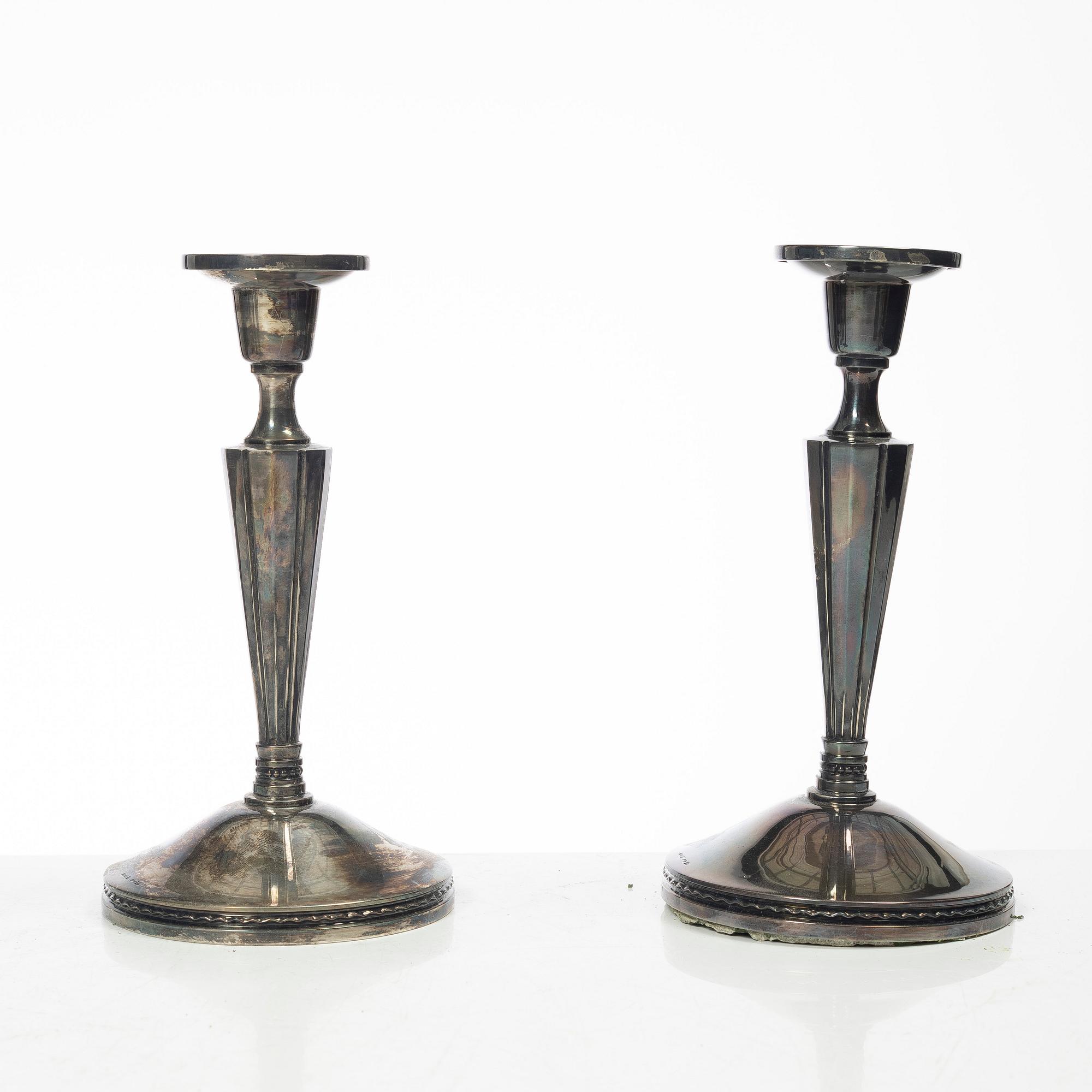 Four pairs och Swedish silver candlesticks, 19th-20th century.