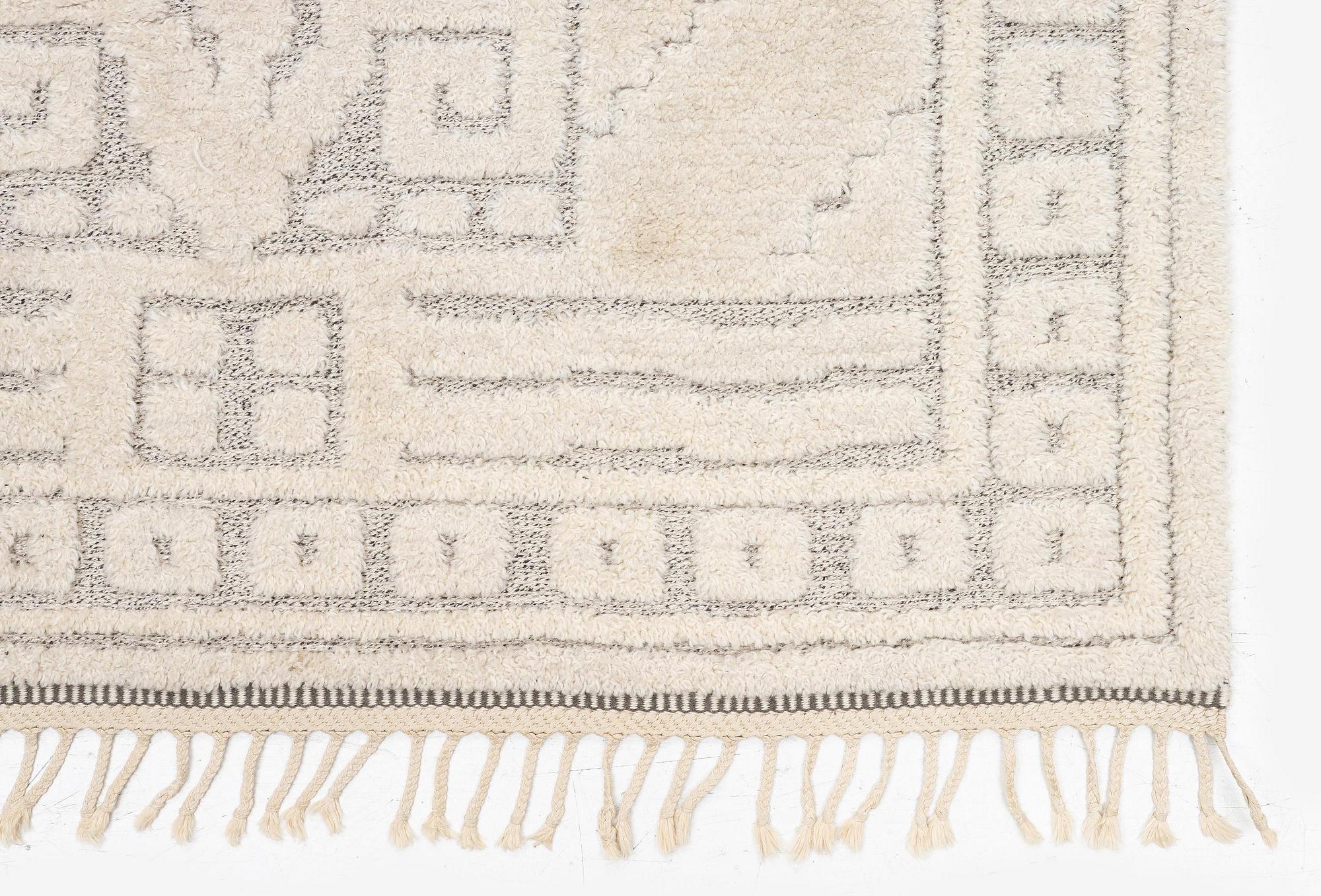 Märta Måås-Fjetterström, a 'Vita spetsporten' carpet, knotted pile in relief,  c. 218 x 119 cm, signed AB MMF,