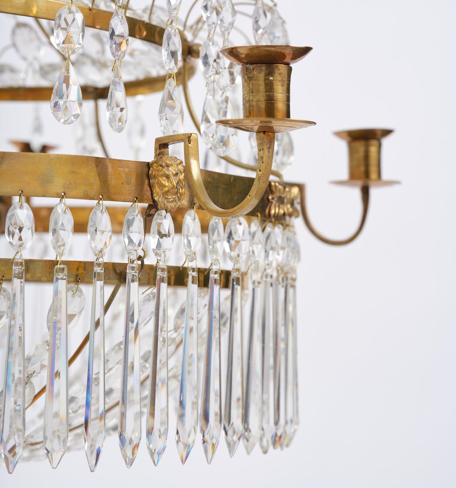 A late Gustavian gilt brass and cut glass seven-light chandelier, Stockholm, late 18th century.