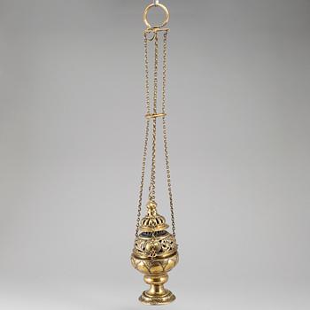 An 18th century brass censer.