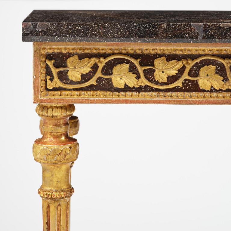 A late Gustavian carved giltwood and marble console table attributed to P. Ljung (1743-1819).