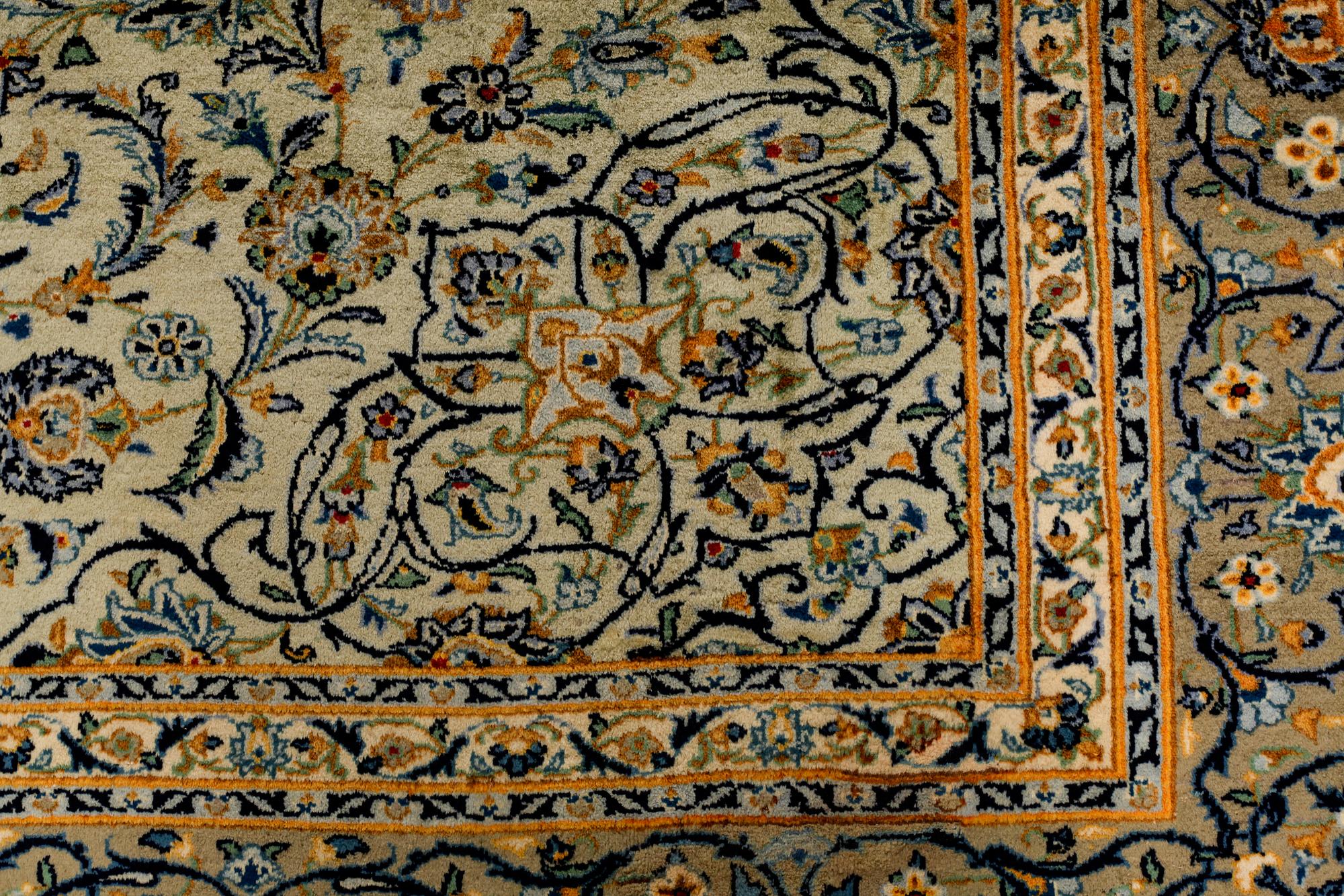 A Keshan rug, signed, ca 370 x 268 cm.