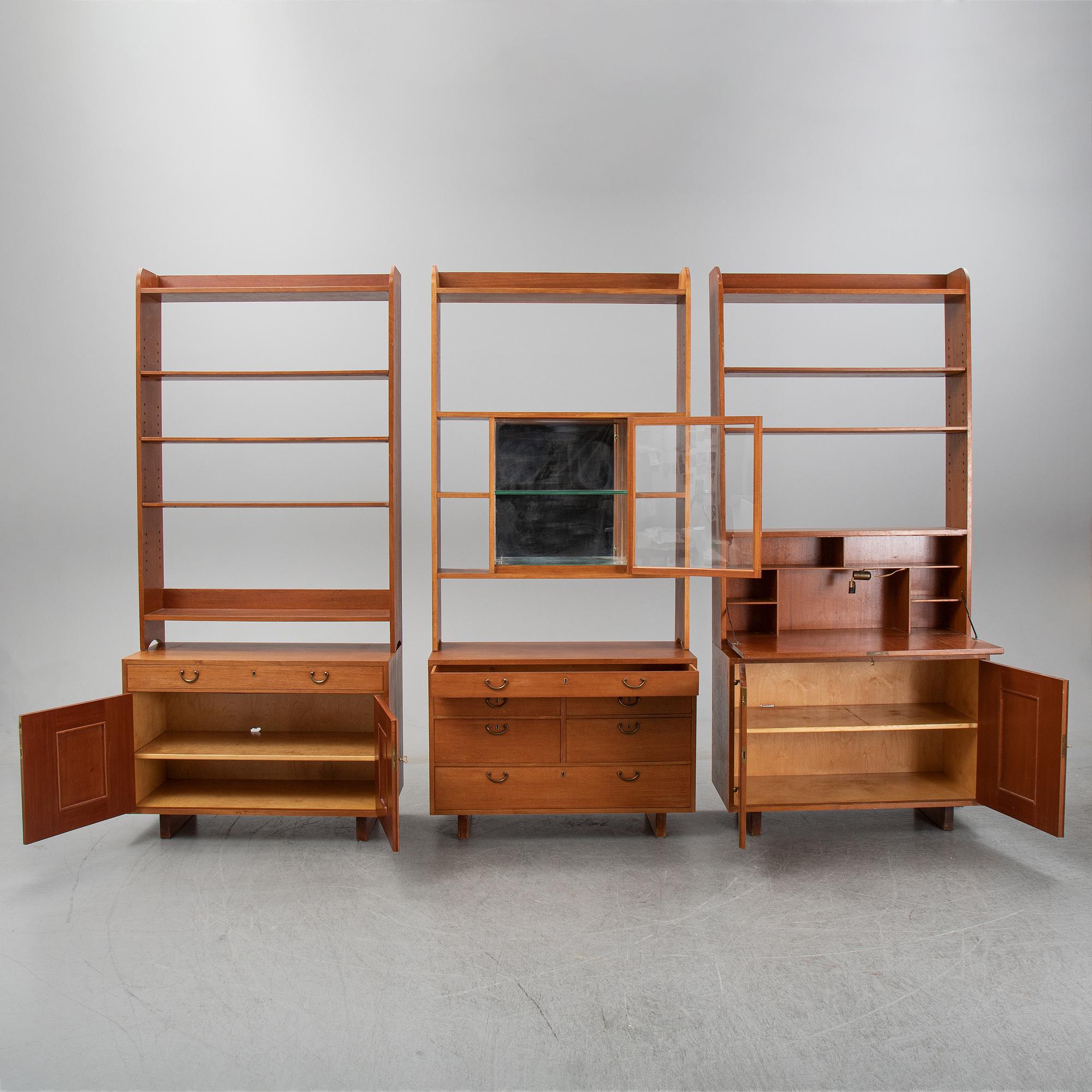 Josef Frank, a set of three mahogany bookcases, model 2112, Firma Svenskt Tenn.