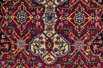 A semi-antique Semnan carpet, North Persia, c. 412 x 304 cm.