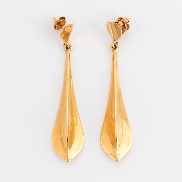 18K gold earrings.