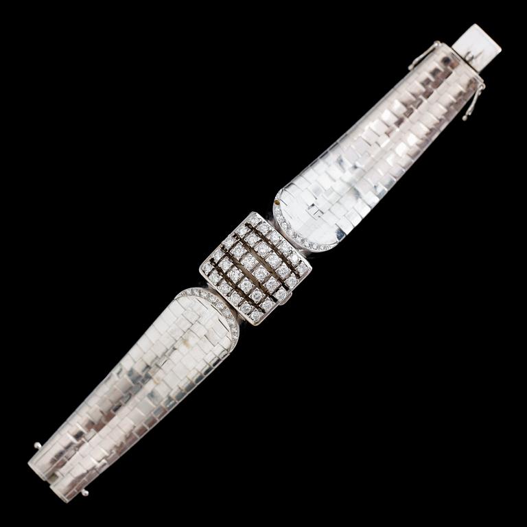 DAMUR, 18K vitguld, IWC, briljantslipade diamanter tot ca 1.50 ct. Tot vikt ca 81 g.