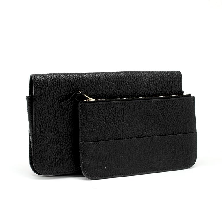 HERMÈS, a black leather wallet, "Dogon".