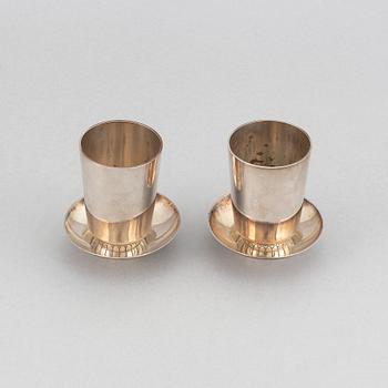 Sigvard Bernadotte, two beakers and two ashtrays, Copenhagen 1945-77, sterling silver, design nr 825A and 825.