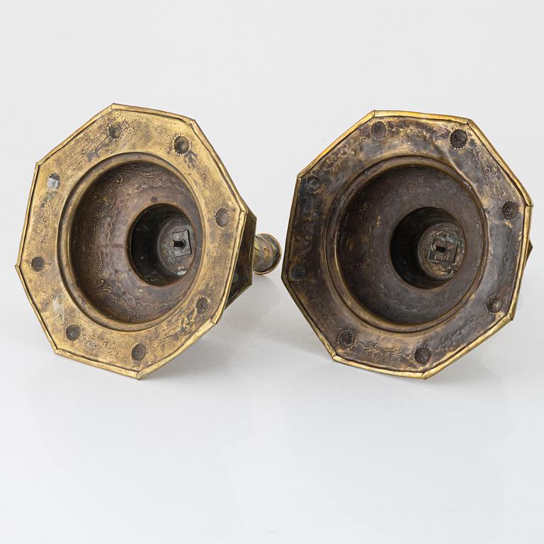 A pair of brass candlesticks, Baroque style, circa 1900.