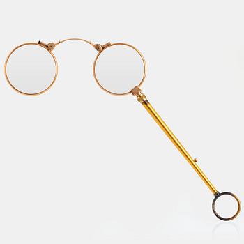 A 14K gold lorgnette.