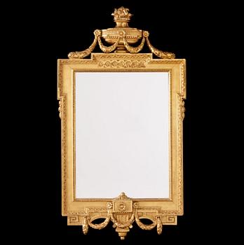 A Gustavian mirror dated 1777.