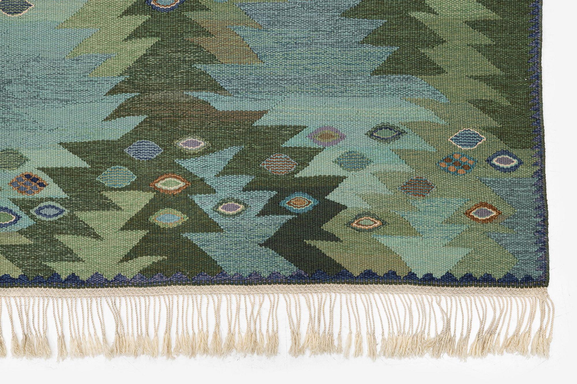 Barbro Nilsson, a 'Tånga blå',  tapestry weave carpet, c. 345 x 277 cm, signed AB MMF BN.