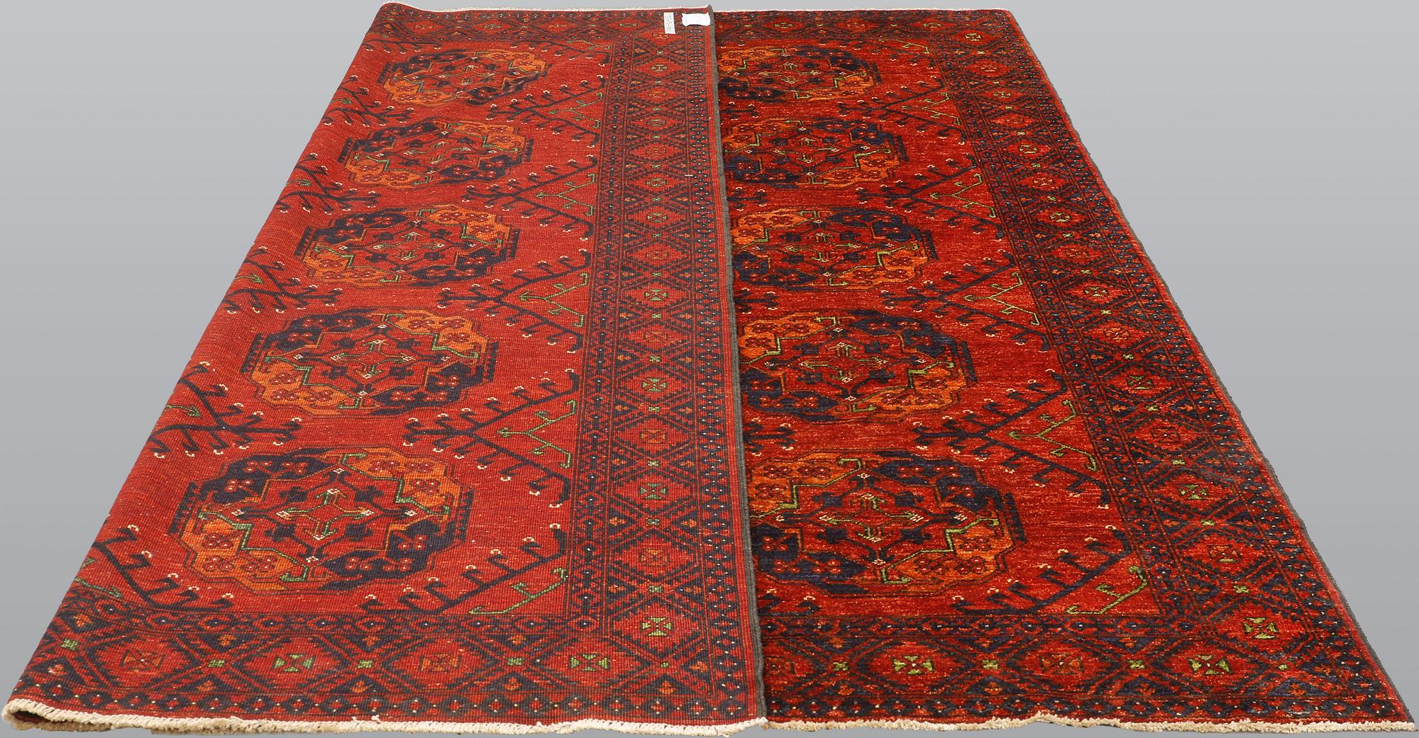 An Afghan carpet, ca 285 x 253 cm.