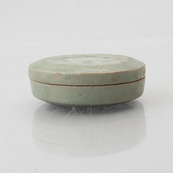 A Korean Celadon glazed box with cover, Koryo dynasty (918–1392).