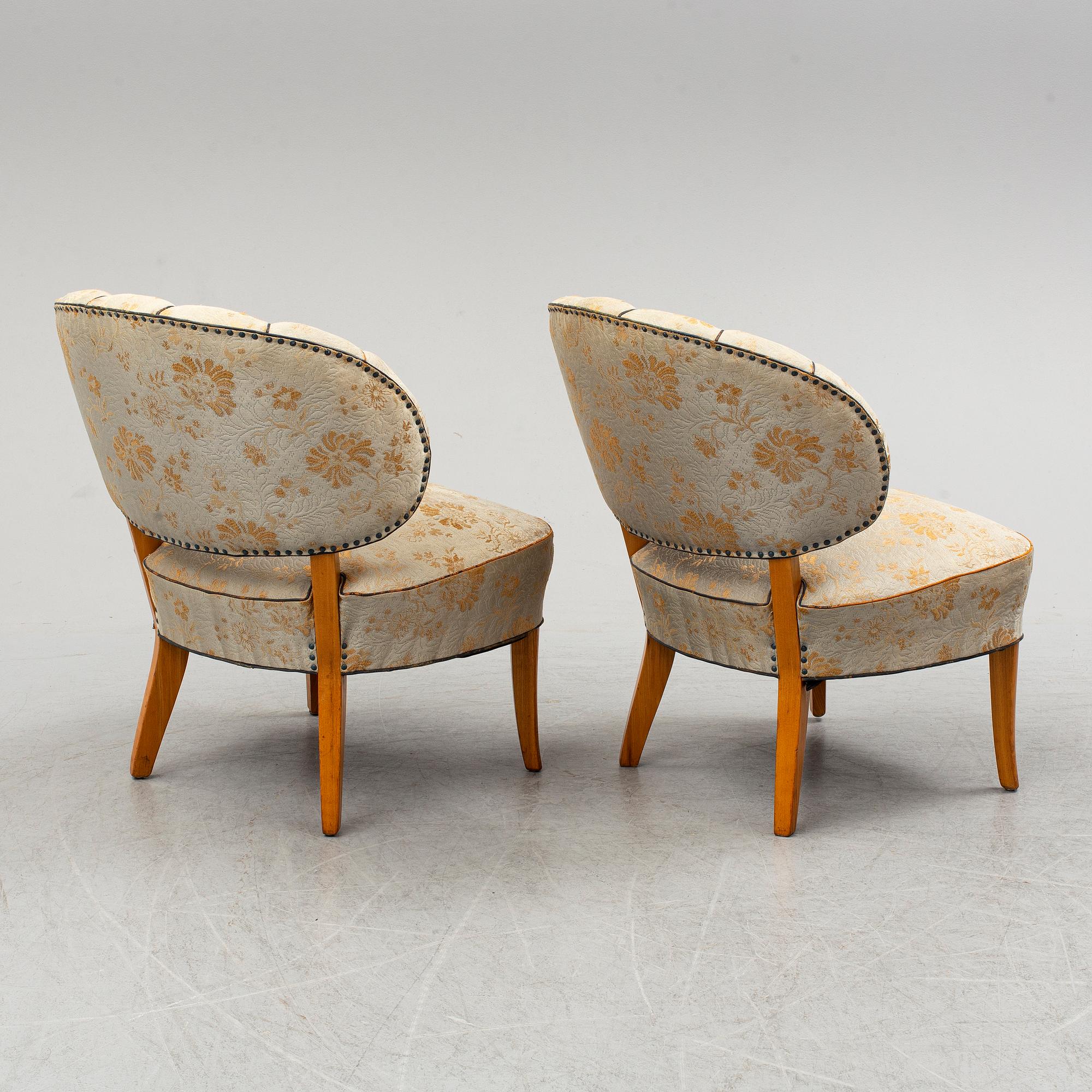 A pair of easy chairs 'Gamla Berlin' by Carl Malmsten.