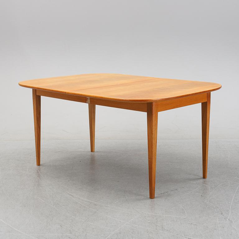 Josef Frank, a model '947' mahogany veneered dinner table for Firma Svenskt Tenn.