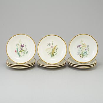A set of 15 porcelain plates from Nordiska Kompaniet, first half 20th century.