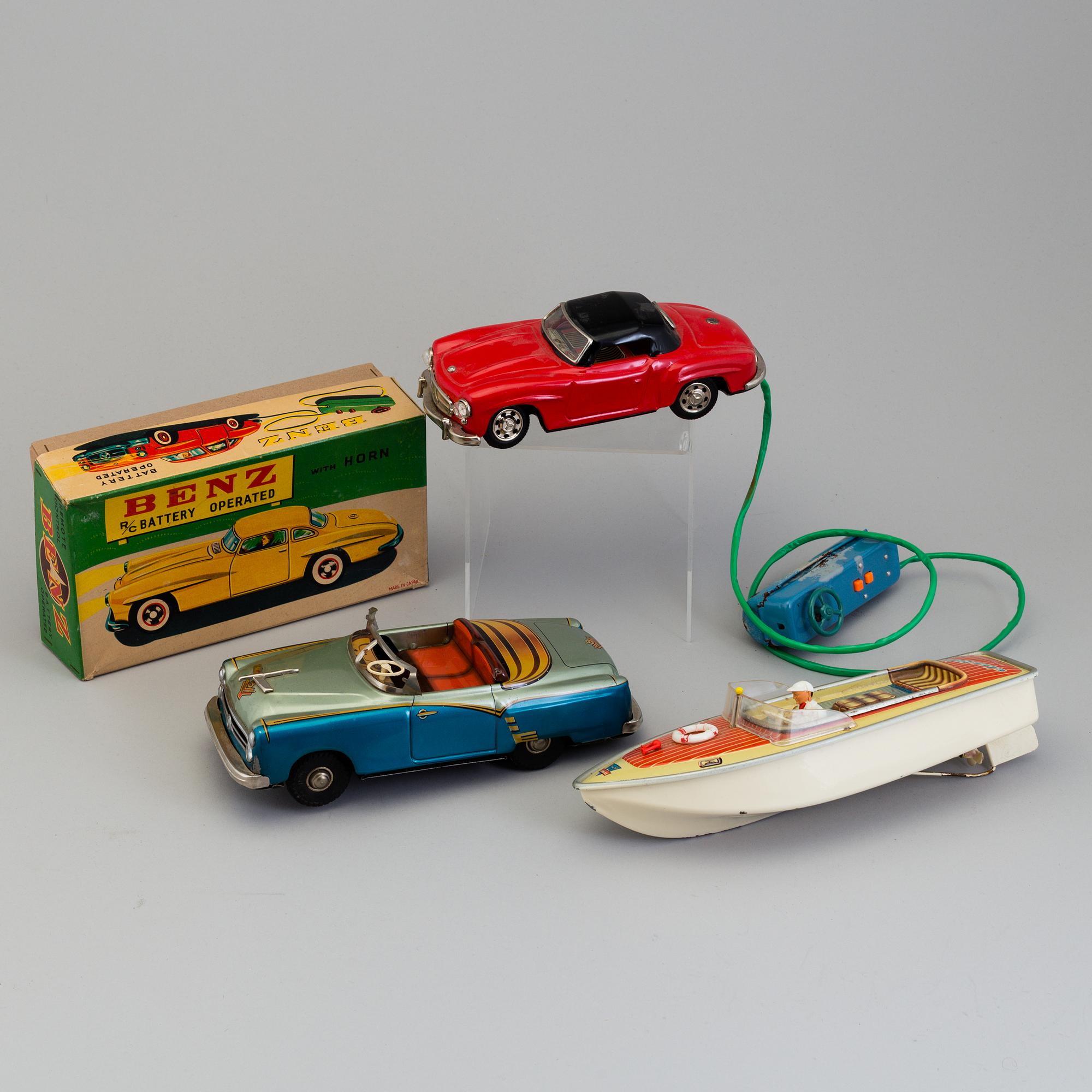 THREE TIN PLATE TOYS, mid 20th century.