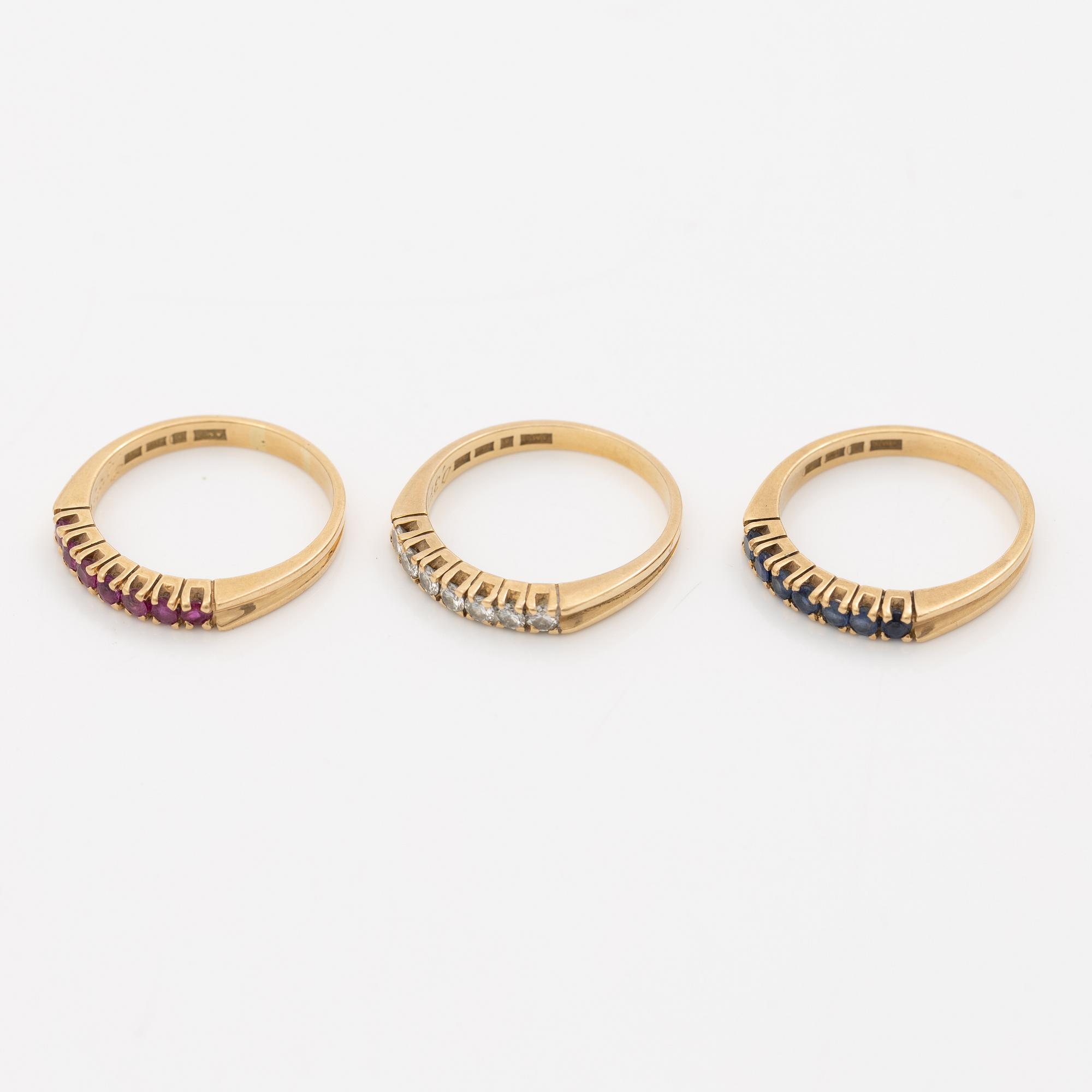 Three rings, 18K gold with sapphires, brilliant-cut diamonds and rubies.
