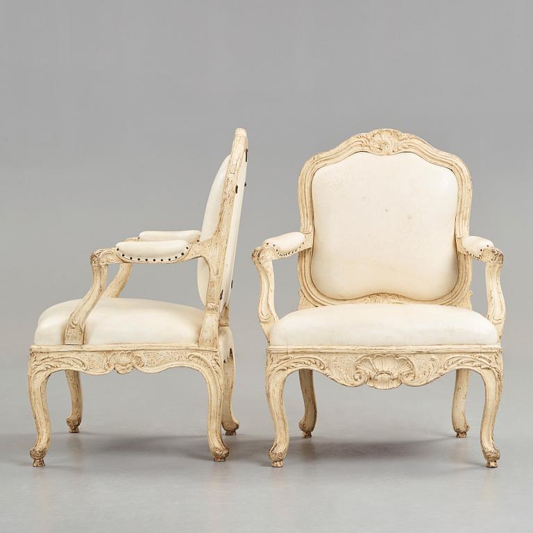 A pair of Swedish Rococo 18th century armchairs attributed to Carl Magnus Sandberg (master in Stockholm 1759-1789).