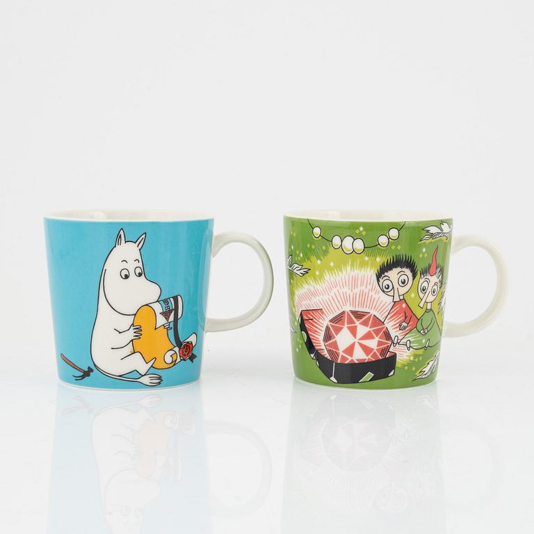 A group of eight porcelain 'Moomin Characters' mugs, Arabia.