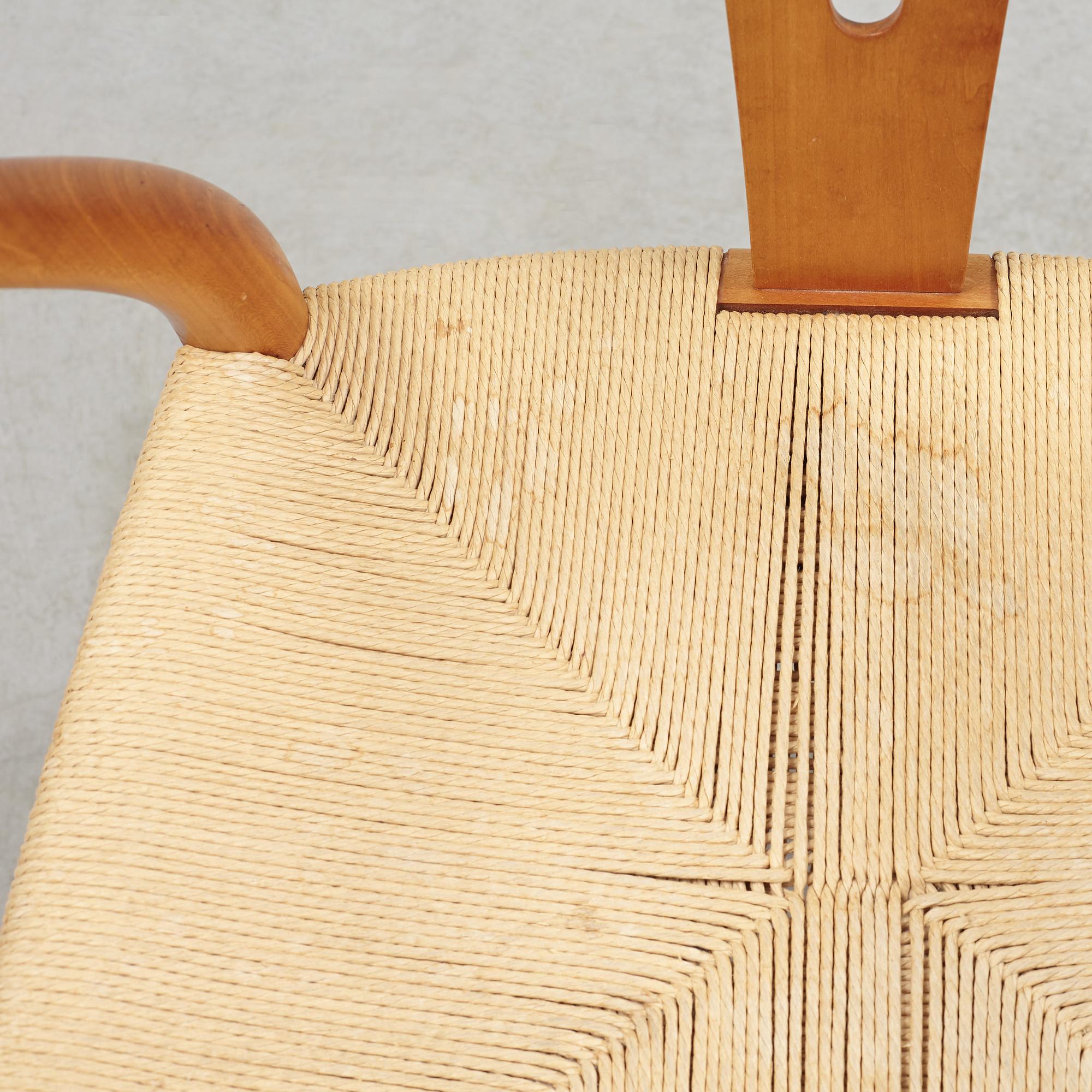 A set of four + two armchairs 'Y-chair' by Hans J Wegner, Carl Hansen & Son, Denmark.