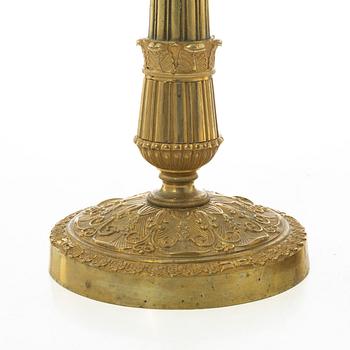 A pair of French Empire candlesticks, early 19th century.