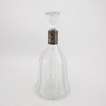 A decanter with silver fitting and a free mason late 19th century glass.
