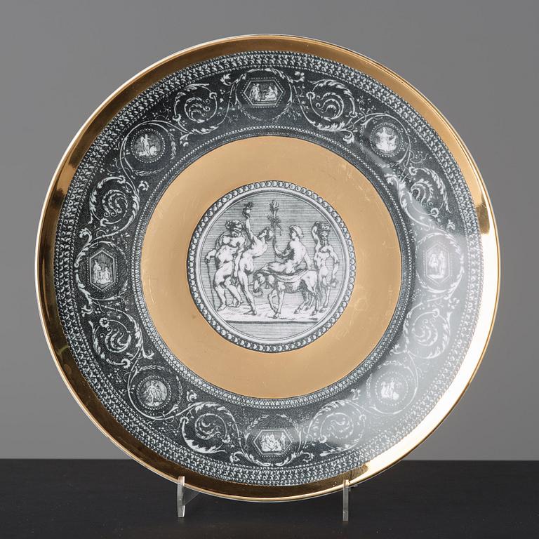Piero Fornasetti, a set of six "Cammei" porcelain plates, Milano, Italy.