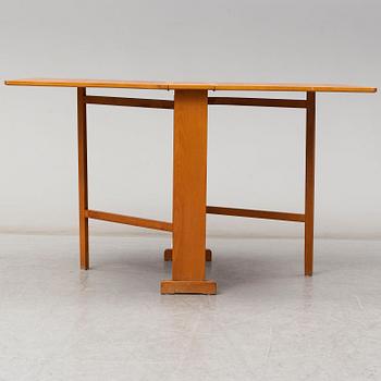 A mid 20th Century gate-leg table.