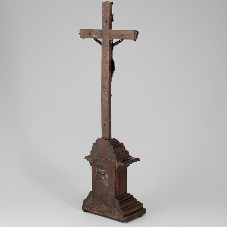 An 18th century silver and wood crucifix.