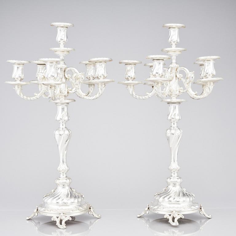 A pair of Swedish silver candelabra, mark of Gustaf Möllenborg (Carl Teodor Feron), Stockholm 1896.