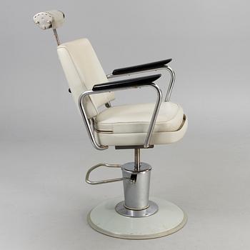 A 1950s barber chair.