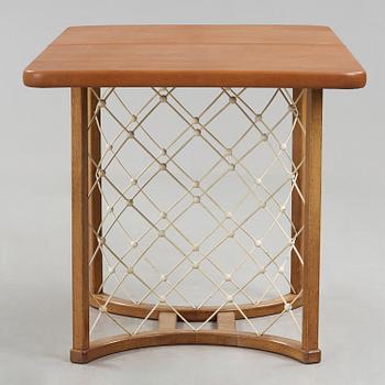 A modernist oak based table, 1940-50's.