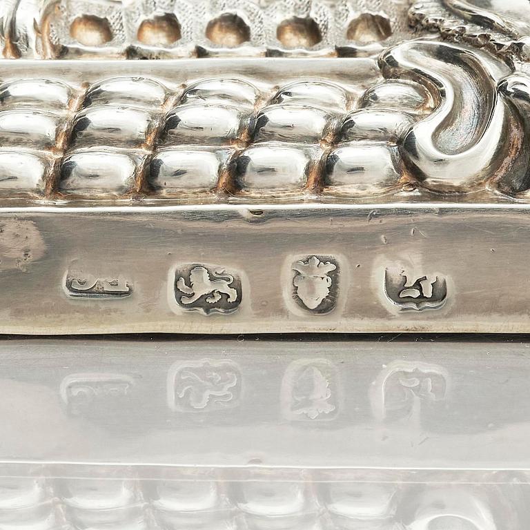A pair of 18th century silver candlesticks, marks of Ebenezer Coker, London , possibly 1765.