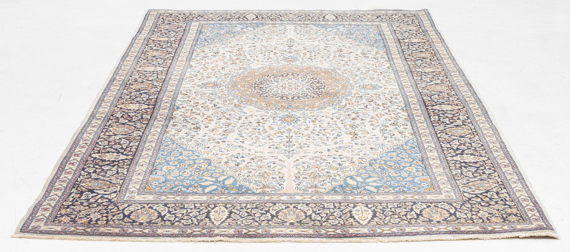 A oriental rug, c. 260 x 155 cm.