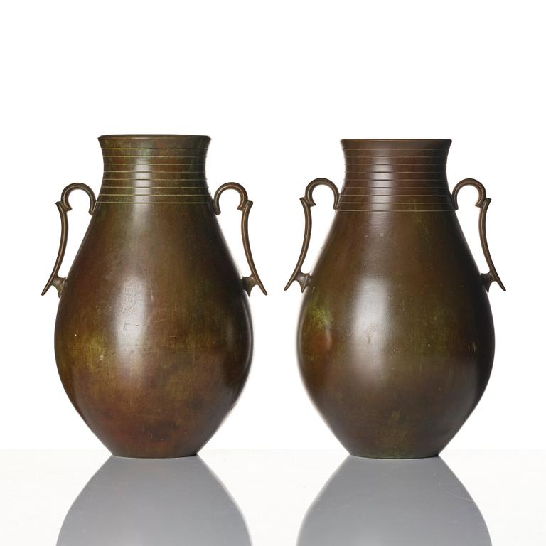 Guldsmedsaktiebolaget (GAB), a pair of Swedish Grace bronze vases, probably designed by Jacob Ängman.