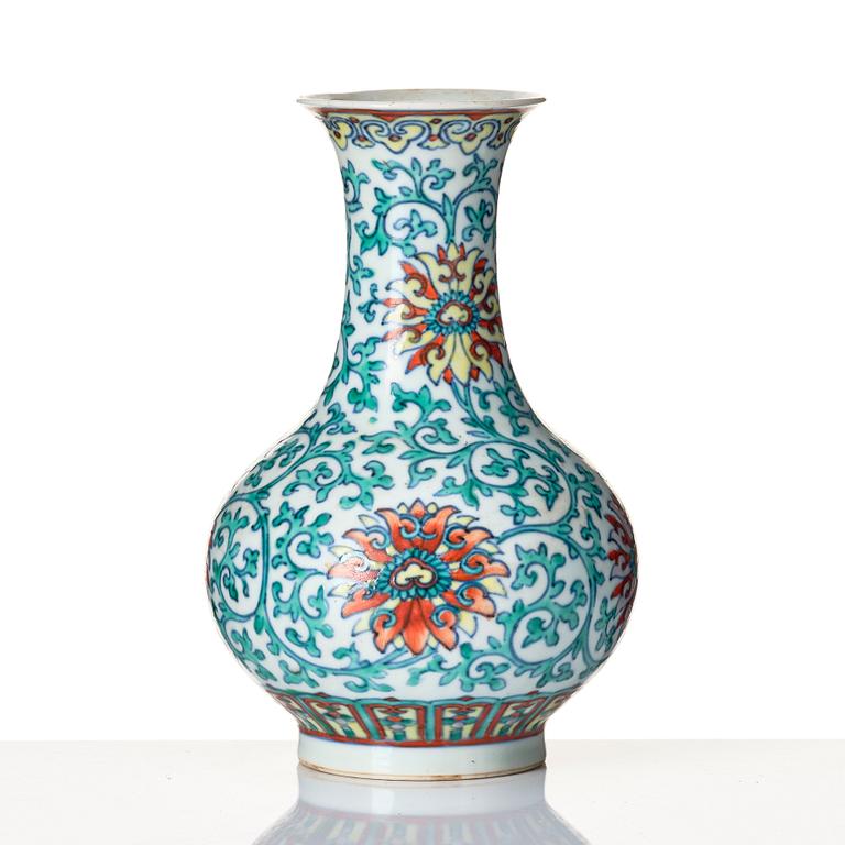 A doucai 'lotus' vase, Qing dynasty with Qianlong seal mark and of the period.