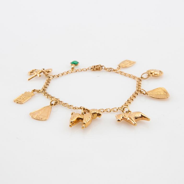 Armband Bismarck-länk 18K guld med berlocker.
